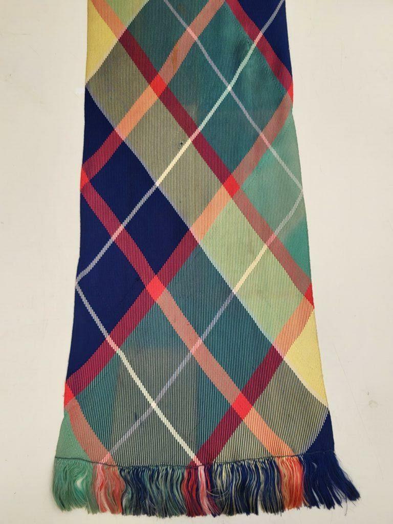 A collection of high-quality narrow textiles including colorful braided cords, woven ribbons, and piping tailored for apparel and accessories.
