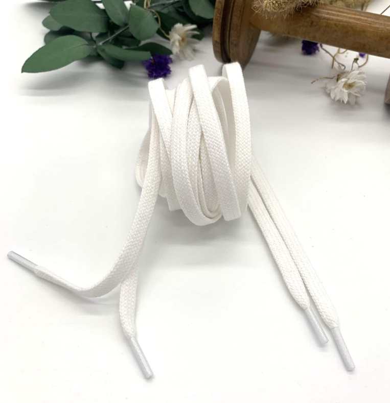 Flat cotton laces in white, handmade in France by SCF