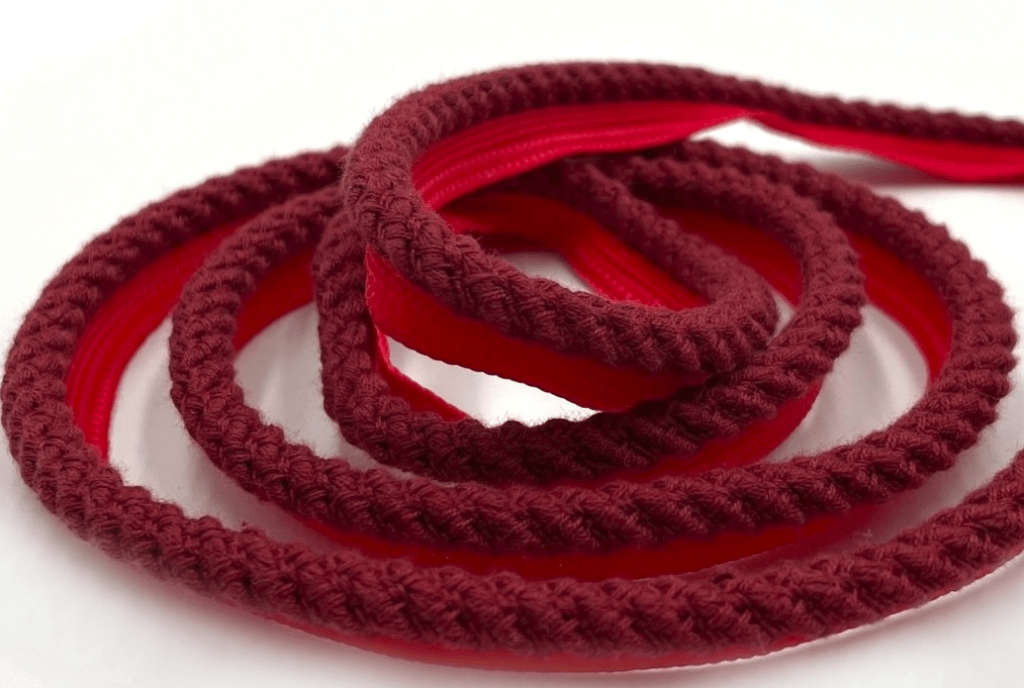 French triming red in citon from scf to the Atelier de tressage