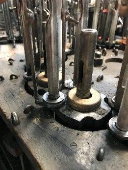 Slot (Ouche) 

A notch in the carrier disc (poupée arbrée).